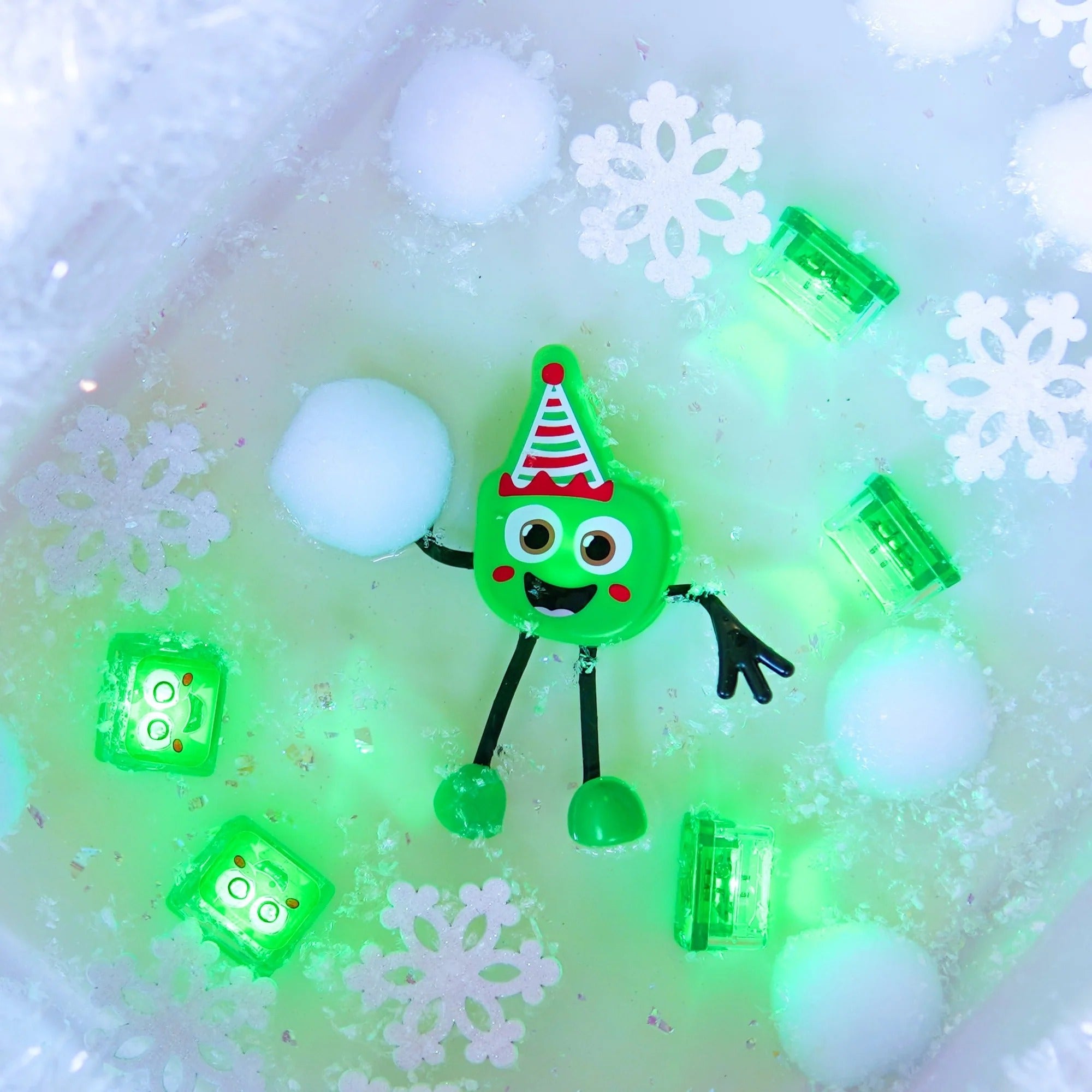Glo Pals - Personnage et cubes lumineux activés par l'eau - Édition Noël