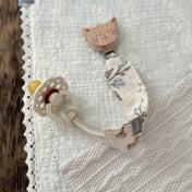 Attache-suce - Chat en Mousseline de Coton