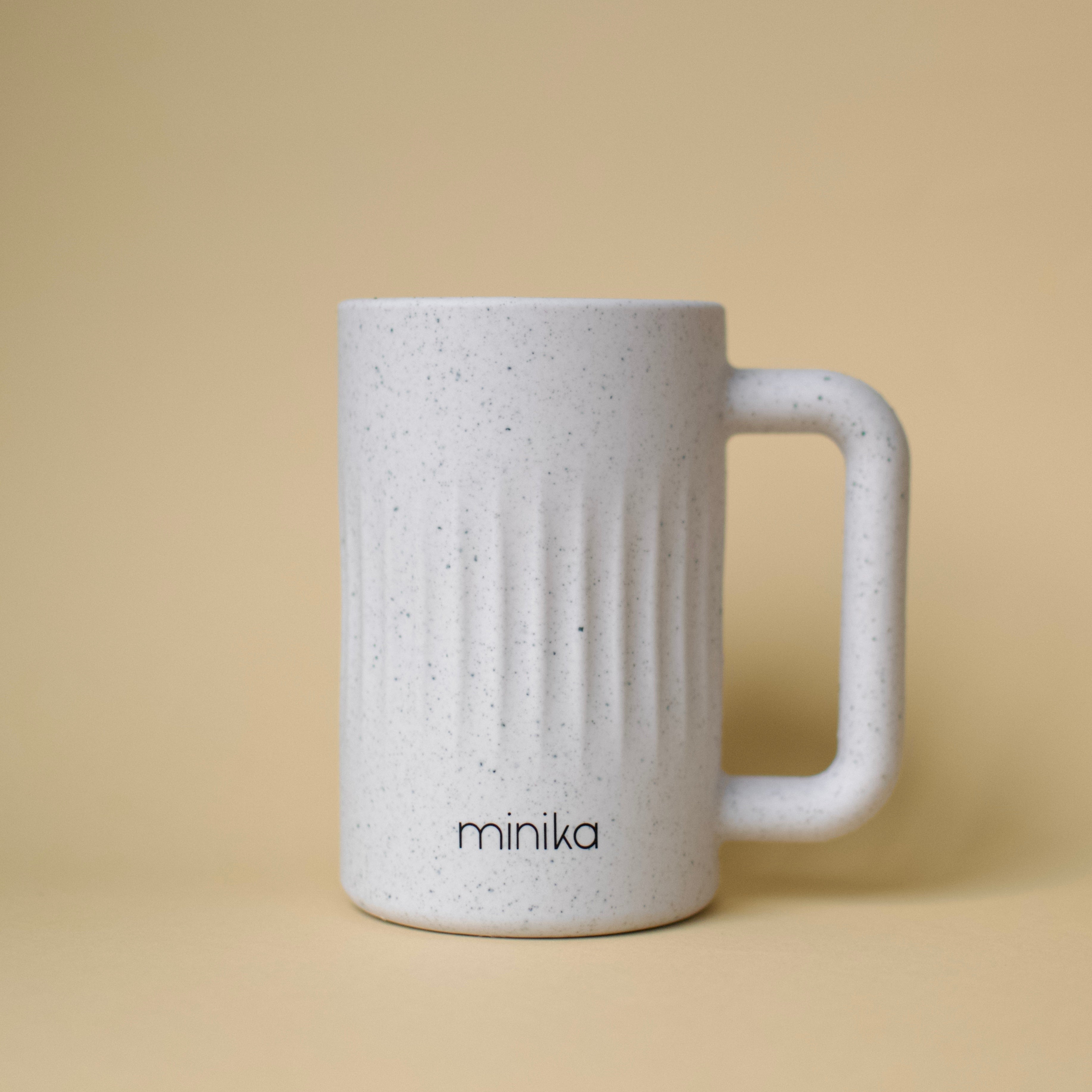 Tasse de rinçage pour le bain