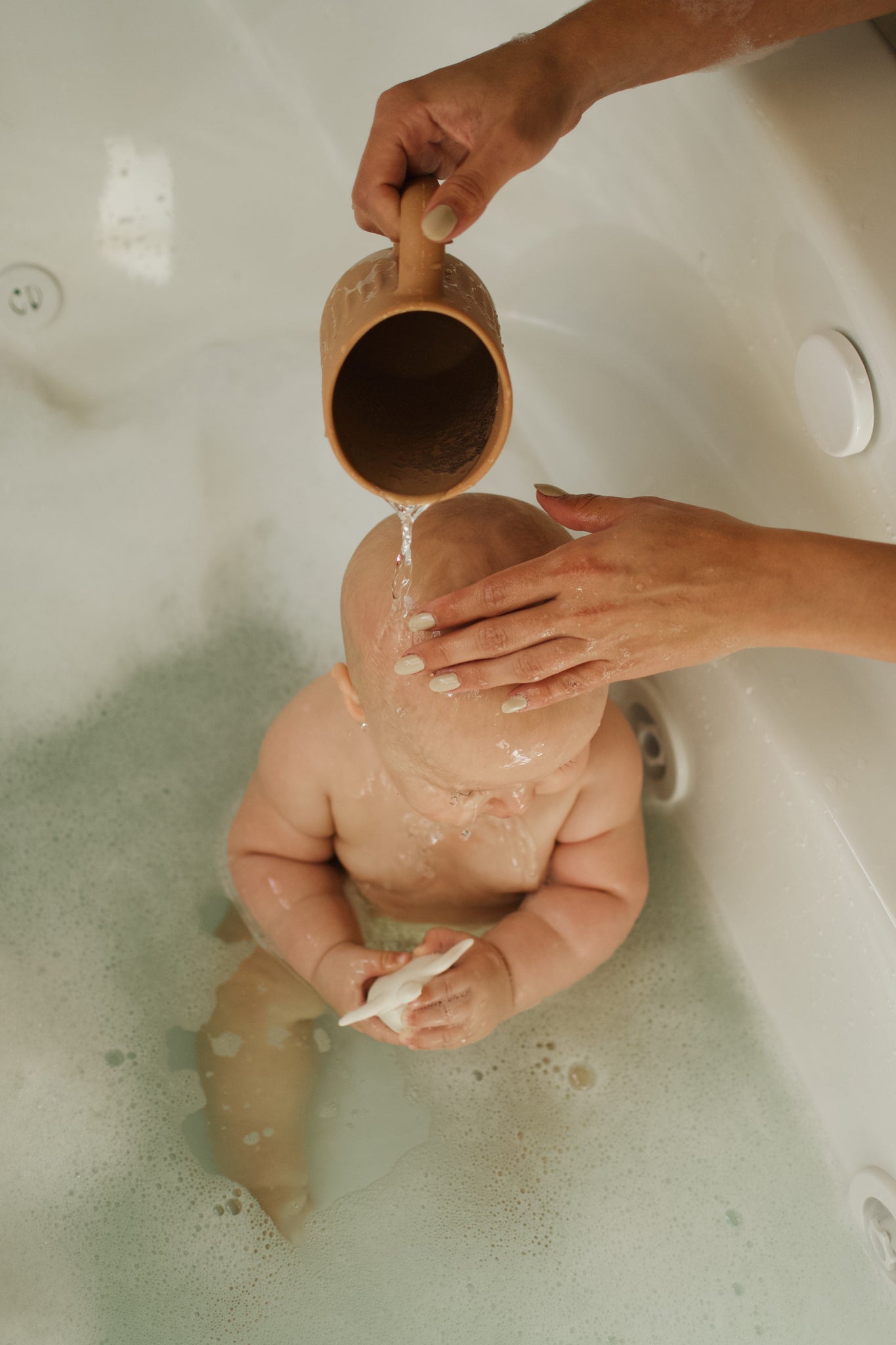 Tasse de rinçage pour le bain