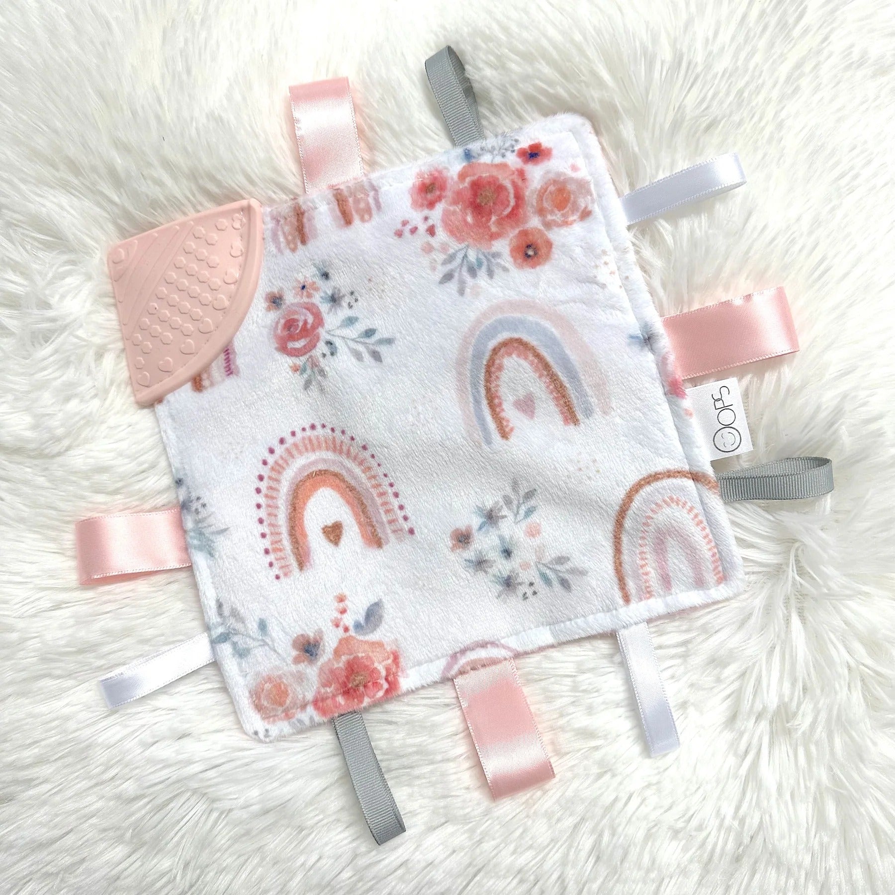 Doudou craquante - Arc-en-ciel fleuris
