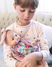 Poupée Bébé Rose en pyjama